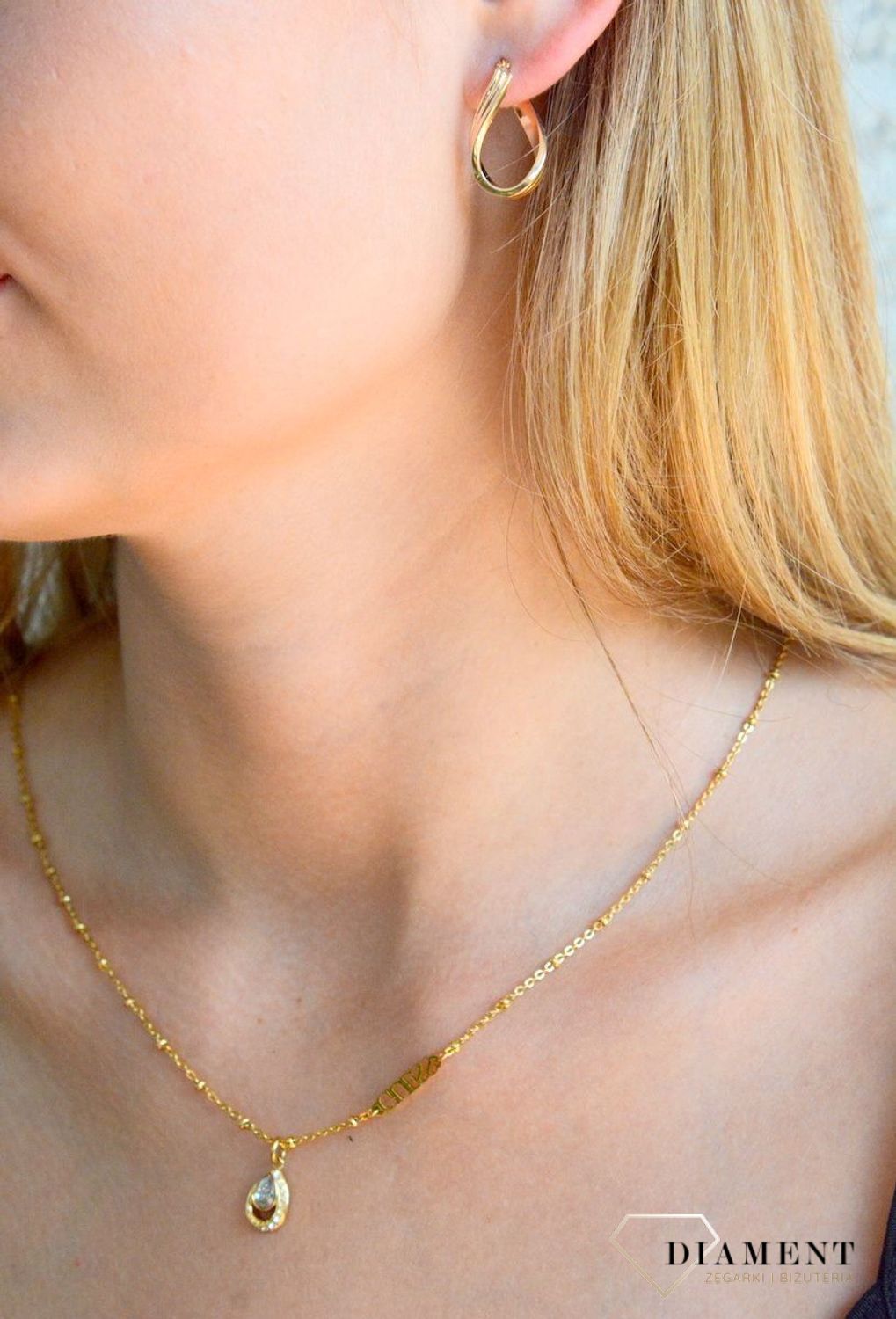 Złote kolczyki damskie 375 zakręcony wzór KL 4605 375.jpg